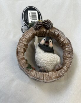 Hanging Penguin on a Birch Log